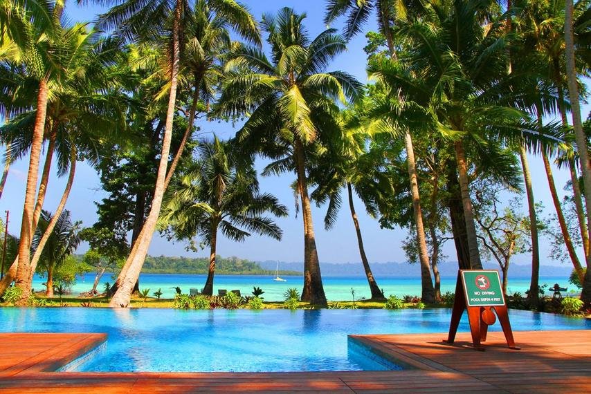 Tropical resort pool overlooking the Andaman sea